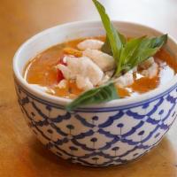 Coconut Crab Curry · Spicy. Issan traditional red curry dish with lump crab meat, bell peppers, pineapple, eggpla...