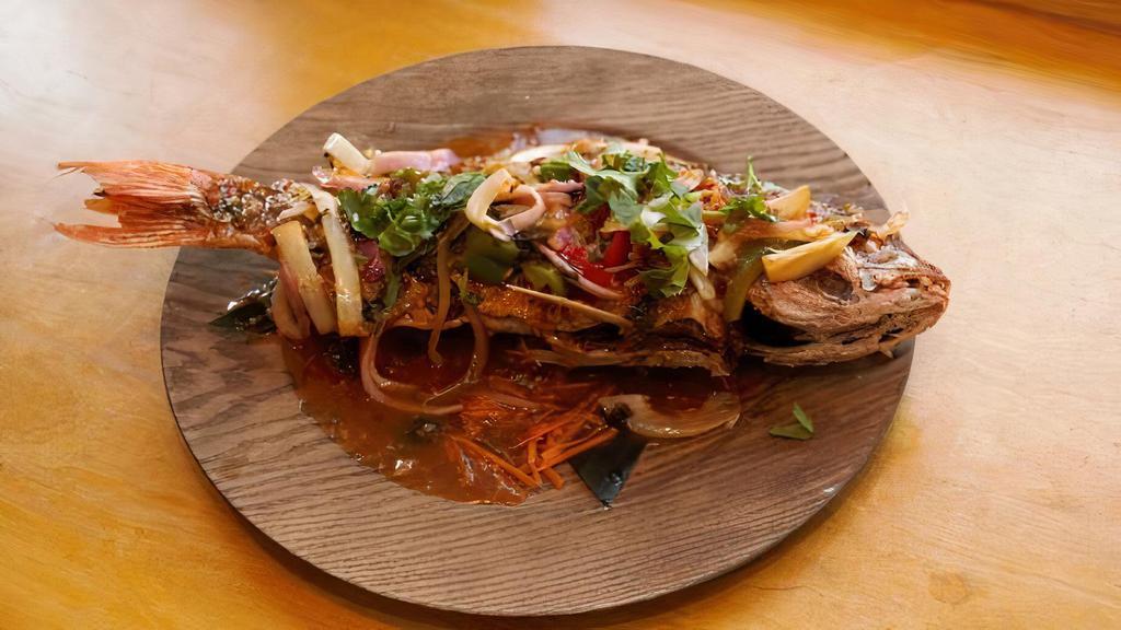 Whole Red Snapper · Spicy. Deep-fried whole red snapper topped with Thai sweet garlic chili sauce.