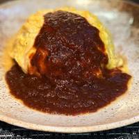 Bohemian'S Omelette  Rice · Japanese tomato sauced chicken rice covered with cooked egg with original demi-glace sauce.
...