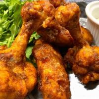 Bohemian Spicy Chicken Wings · 5 pieces, house blended special hot chili sauce and blue cheese dipping sauce on the side