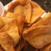 #9. Crispy Fried Wonton (10) · Served with sweet and sour sauce.