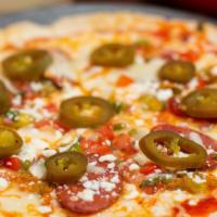 Mexican Pizza · Cotija, pepper jack, chorizo, jalapeño, pico de gallo, zucchini flower, tomato sauce.