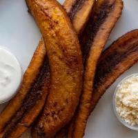 Sweet Yellow Plaintain · 4 pieces of golden fried sweet plantains. Served with fresh cheese and sour cream.