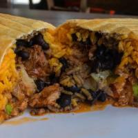 Chimichanga Burrito · This burrito is deep fried till golden brown.. Inside contains Rice, Beans, Pico de gallo, l...