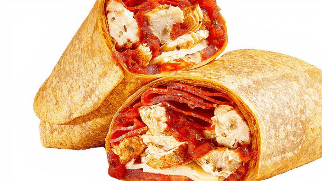 Chicken Pizziola® (590 Cals) · We wrap up a little bit of Italy with grilled chicken, pepperoni, provolone cheese and marinara sauce all in a tomato basil wrap.
