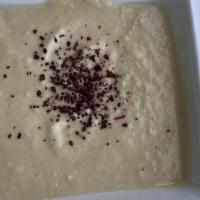 Hummus · Ground chick peas with tahini, garlic and olive oil.