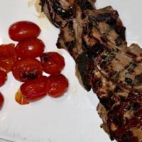 Lamb Chops Kabob · Marinated lamb chops, roasted tomato & saffron basmati rice.