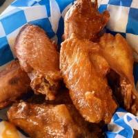 Chicken Wings · Twelve (12) or more party wings seasoned with your favorite flavor.