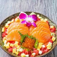 Salmon Chirashi Bowl · 8 oz fresh salmon, tuna ground, ikura, tobiko, tamago, cucumber, shredded nori, pickled ging...