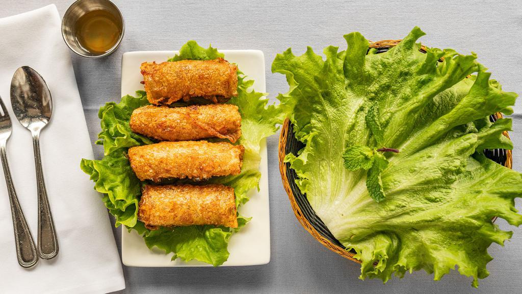 Vietnamese Spring Rolls · Vietnamese spring rolls stuffed with pork, shrimp, mushroom and crystal noodles, served with lettuce and nuoc mam sauce.