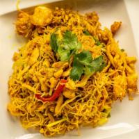Singapore Curry Rice Noodles · Sautéed with shrimp and chicken.