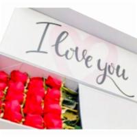 Deluxe Box · This delicate and luxury box includes 25 red roses and a personalized message.