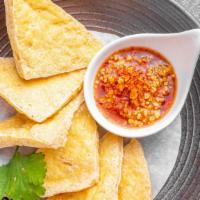 Crispy Tofu · Fried firm tofu served with sweet chili sauce.