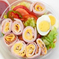 Chef Salad · Turkey, ham, American, swiss, lettuce, tomato, cucumber, and a hard-boiled egg.