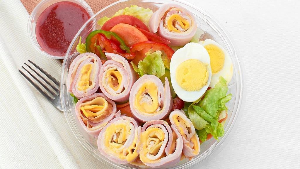 Chef Salad · Turkey, ham, American, swiss, lettuce, tomato, cucumber, and a hard-boiled egg.