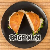 Bagelman Trio · Ham, turkey, swiss, lettuce and tomato on a roll