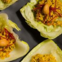 Chicken Lettuce Wrap · Minced curried chicken, carrots, celery and cashews wrapped in lettuce.