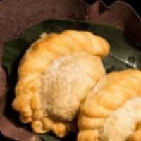 Golden Curry Puffs · Chicken and potatoes with cucumber relish.