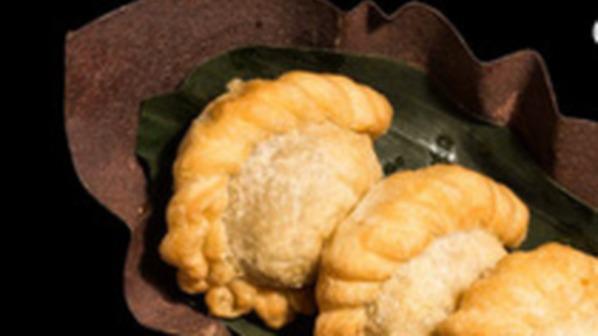 Golden Curry Puffs · Chicken and potatoes with cucumber relish.