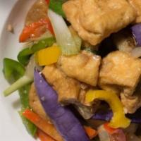 Ginger Tofu Eggplant · Sauteed fried, thai eggplants, onions, bell peppers, carrots, zucchini and baby corn.