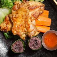 Chicken Bbq · Boneless half chicken marinated in thai spices served with sweet spicy sauce and coconut sti...