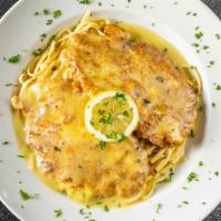 Chicken Francaise · Chicken Breast Sautéed in a Butter Lemon-Wine Sauce Over Rice.