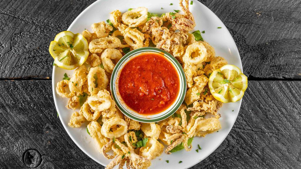 Fried Calamari · Served with a cup of soup or mixed green salad potato vegetable and bread.