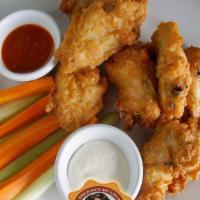 Chicken Wings · Served with carrots, celery and blue cheese.