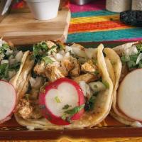 In Soft Shell Tacos · Served with salsa, onions, cilantro and fresh lime with choice of protein. Chicken, steak, g...