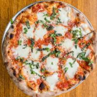 Margherita · The classic featuring tomato sauce, fresh basil and mozzarella