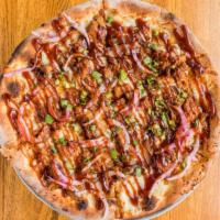 Pit Stop · Mozzarella cheese topped with BBQ pulled pork, pickled onions, scallions and drizzled with B...