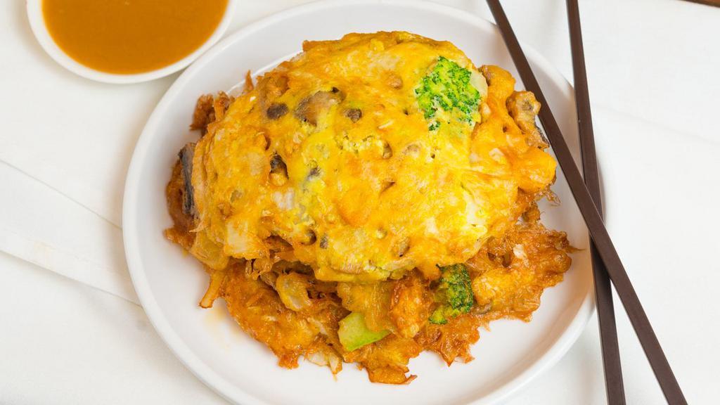 Vegetable Egg Foo Young菜蓉蛋 · 3 pieces. served with white rice. 3