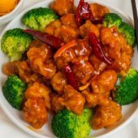 Orange Chicken · Hot and spicy. Deep fried till crispy and served with our delicate orange sauce. Served with...