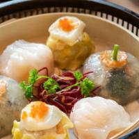 Dim Sum Garden Platter 稻香雀笼拼盘 · 2 shumai with scallop 
2 shrimp dumpling 
2 vegetable dumpling
2 roast pork roll
2 abalone t...