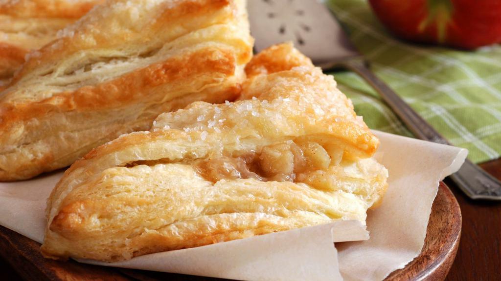 Apple Turnover · Flaky turnover filled with apples and ground cinnamon.