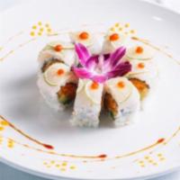 Tasty Roll · Inside: spicy salmon, avocado, outside: white fish nda lime with spicy sauce