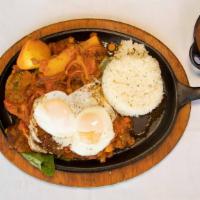 Steak With Creole Sauce & 2 Fried Eggs · Served with rice, beans, fried cassava, and potato.