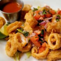 Calamari · Crispy calamari in sweet chipotle sauce.