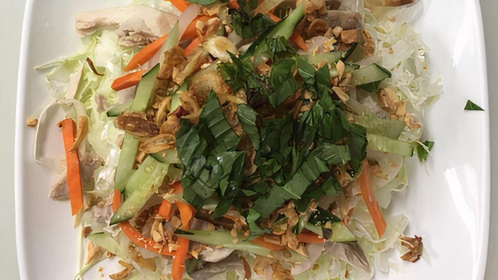 Chicken Salad · Shredded cabbage with chicken, peanuts, fried shallot served with nuoc mam sauce.
