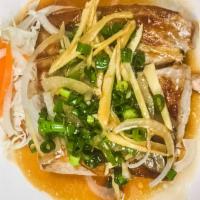 Ahi Ginger & Onion · Pan-seared ahi topped with green onion, white onion, ginger, and sesame shoyu sauce.