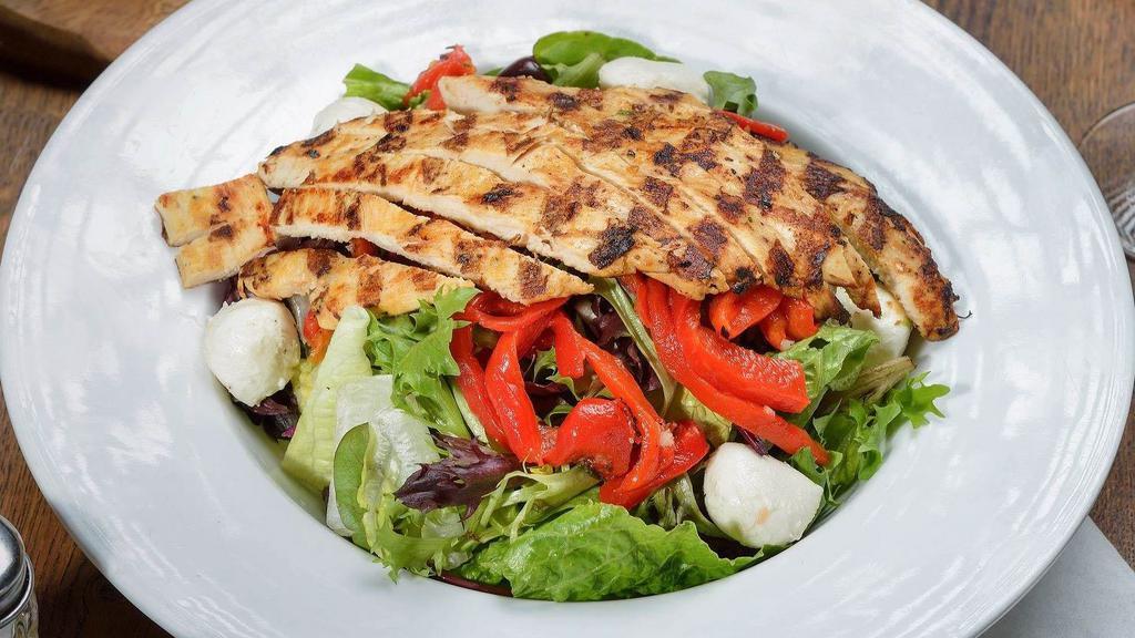 Italian Salad · Marinated grilled chicken, roasted peppers, fresh mozzarella cheese, kalamata olives and balsamic vinaigrette over romaine lettuce.