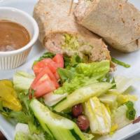Tuna Wrap · With lettuce & tomato. All wraps comes with side salad.