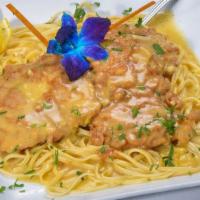 Chicken Francese · Lightly battered and sauteed in lemon and white wine sauce. Served with side salad, your cho...