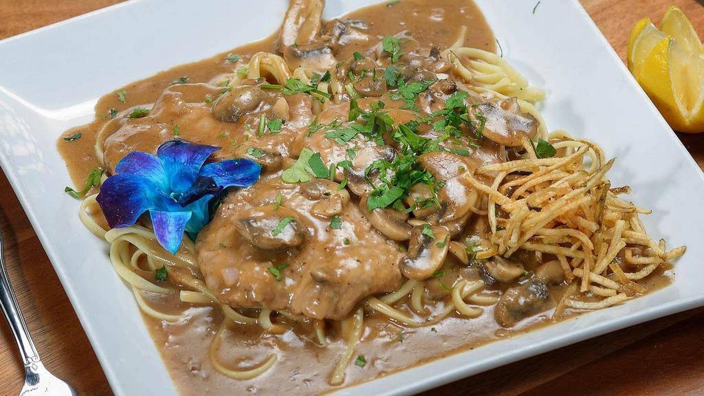 Veal Marsala · Tender veal in a classic marsala wine sauce with fresh mushrooms. Served with side salad, your choice of pasta or roasted potatoes and vegetables.