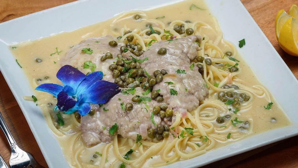Veal Piccata · Served with side salad, your choice of pasta or roasted potatoes and vegetables.