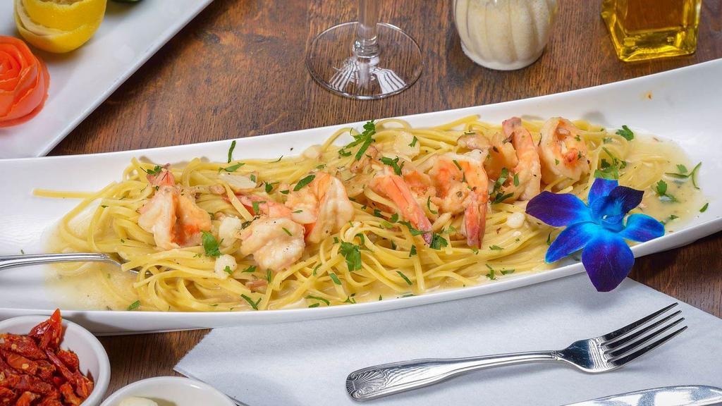 Shrimp Scampi · Jumbo shrimp, garlic white wine lemon sauce. Served with side salad, your choice of pasta or roasted potatoes and vegetables.