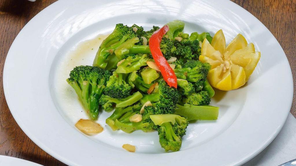Broccoli With Garlic And Oil · Contains gluten-sensitive ingredients. We are not a gluten-sensitive environment. Please let us know of any food allergy or accommodations. Ask for a manager.