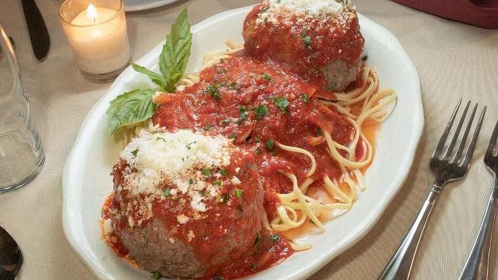Linguini Con Polpette · 2 all beef jumbo meatballs with a marinara sauce and imported Parmigiano reggiano cheese.