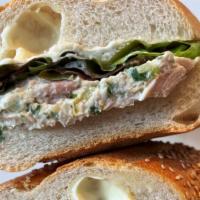 Truffle Chicken Salad Sandwich · Truffle chicken salad with lettuce on a Caputo's seeded hero.
 *this is a cold sandwich*