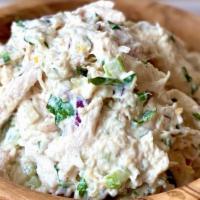 Truffle Chicken Salad · 8 oz container - The decadent taste of truffles and roasted chicken mix perfectly with lemon...